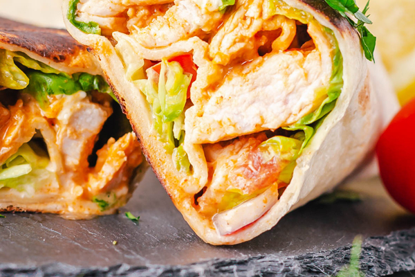 Grilled wrap filled with fresh ingredients and savory flavors