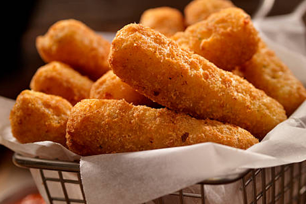 Hearty Italian dinner plate with pasta and traditional sides