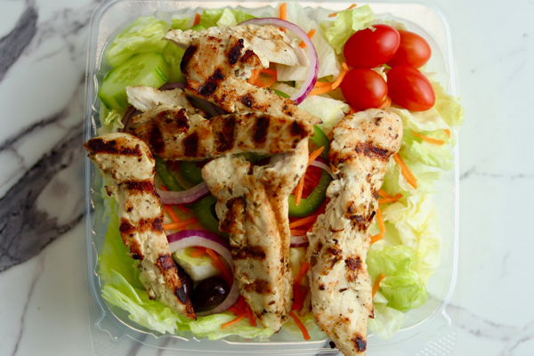 Fresh garden salad with crisp vegetables and house dressing